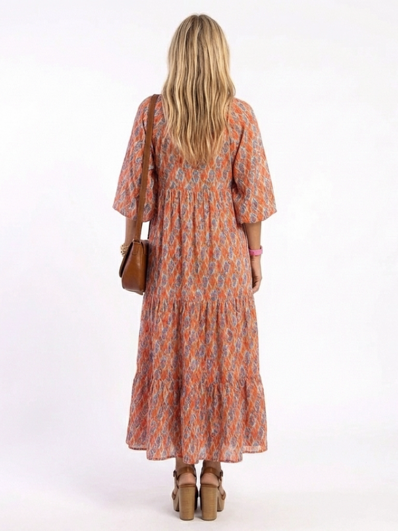 Amara | V-Neck Tiered Midi Dress with Geometric Print