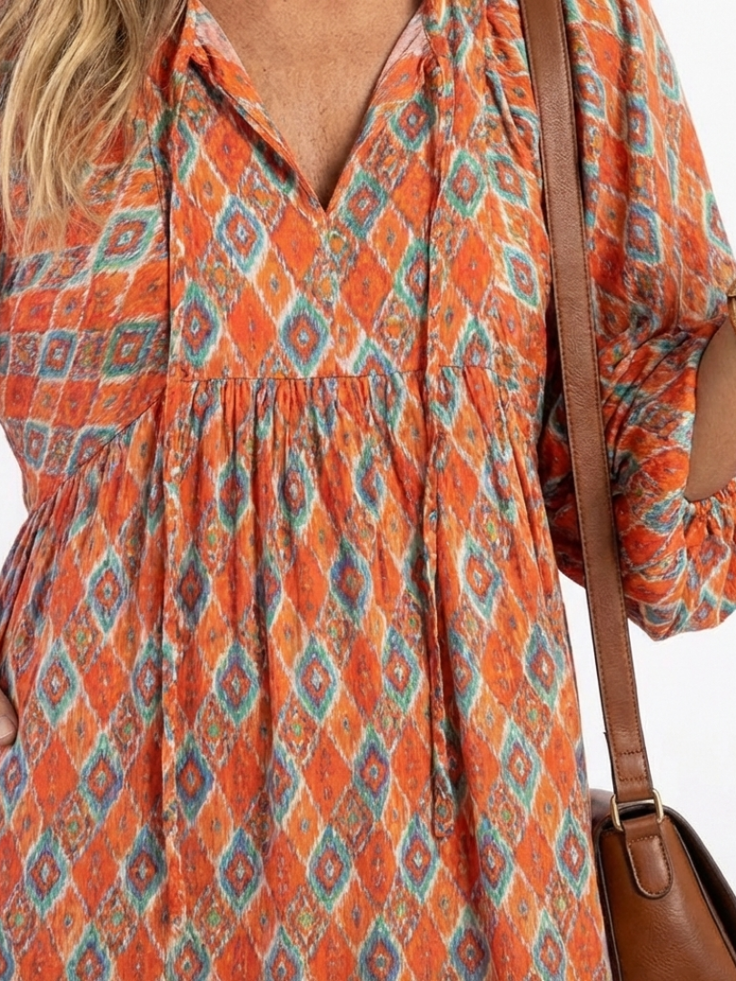 Amara | V-Neck Tiered Midi Dress with Geometric Print