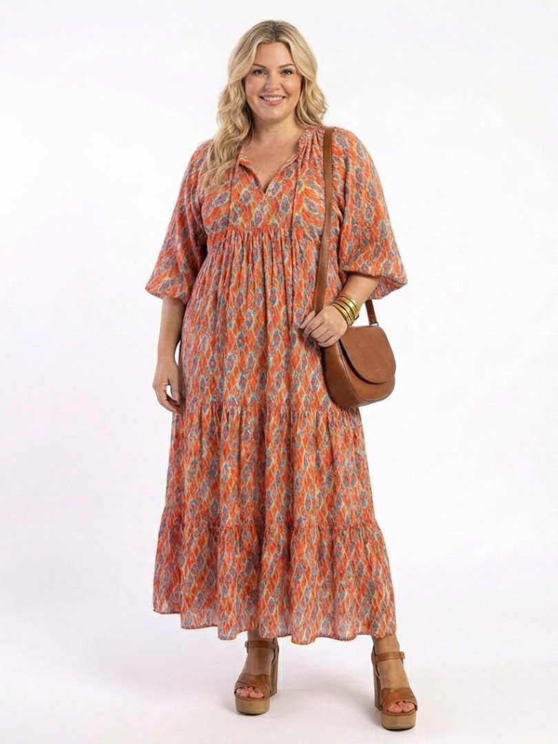 Amara | V-Neck Tiered Midi Dress with Geometric Print